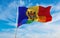 national lgbt flag of Moldova flag waving in the wind at cloudy sky. Freedom and love concept. Pride month. activism, community