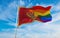 national lgbt flag of Montenegro flag waving in the wind at cloudy sky. Freedom and love concept. Pride month. activism, community