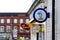 The national lottery and off license advertisement boards seen on the shop building in Stone, Staffordshire, United Kingdom