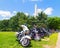 National Monument and multi-colored motorbikes.