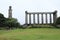 National Monument and Nelsons Monument on Calton hill, mountain in Edinburgh in east of Scotland