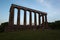 National Monument of Scotland in silhouette on Calton Hill, Edinburgh, Scotland