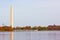 National Monument with trees around the Tidal Basin in autumn foliage.