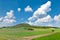 National mystic hill Rip, Central Bohemia, Czech republic - spring landscape with green fields and blue sky with clouds