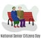 National Senior Citizens Day, elderly people sit on a bench in the park