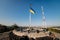 National Yellow-blue Ukrainian flag against the blue sky on mound of Union of Lublin at Castle Hill in Lviv city, Ukraine