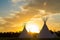 Native American Tepees on the Prairies at Sunset