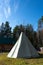 Native American wigwam in the forest. Modern material for the manufacture of wigwam. Yurt is the home of the northern peoples