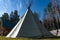 Native American wigwam in the forest. Modern material for the manufacture of wigwam. Yurt is the home of the northern peoples