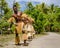 Native dancers entertain tourists visiting Mystery Island.