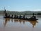 Native Malagasy people crossing river