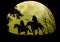 Native Riders Under Moonrise