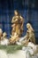 Nativity scene. Holy night scene with saint figurines and baby Jesus in creche.Christmas decor in city street. Winter holidays in