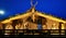 Nativity scene on a wooden house at the Christmas market