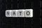Nato control text word title caption label cover backdrop background. Alphabet letter toy blocks on black reflective background. N