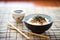 natto garnished with seaweed and sesame seeds