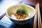 natto garnished with seaweed and sesame seeds