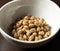 Natto placed against a dark wooden background