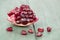 Natural antioxidant, pomegranate seeds on a wooden background