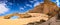 Natural arch in desert with sandstone and granite rock Wadi Rum in Jordan