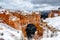 Natural Arch formation with snow in Bryce Canyon.