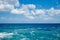 Natural background blue sea with waves, azure clear water beach