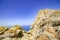 Natural bare rock formation and arid landscape, Santorini, Greece