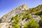 Natural bare rock formation and arid landscape, Santorini, Greece