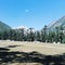 natural beauty of kalam ground snow on mountains green trees