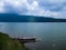 Natural Beauty Of Mountains Lake Beratan And The Canoe At Bedugul