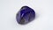 natural blue lapis lazuli gem stone on the white background