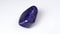 natural blue lapis lazuli gem stone on the white background