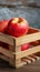 Natural bounty Half apple in rustic wooden crate, copy space