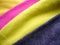 Natural bright knitted fabric of different colors. Bright sweaters, cashmere fabrics, wool.