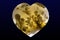 Natural carnelian crystal heart Quartz Agate on dark background