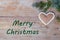 Natural Christmas greetings with gingerbread heart