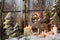 Natural christmas window decoration of wood with snow.