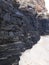 Natural coal seam above ground on a coastal headland Newcastle NSW Australia