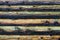 Natural colorful weathered log cabin wood wall. Wooden background pattern.