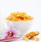 Natural corn flake breakfast cereal in cups and milk is a healthy breakfast that is good for your body every day on a white