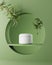 Natural cosmetic minimal stage for product presentation. Cosmetic jar podium and green leaf on monochrome background. 3d