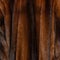 Natural dark brown shiny fur texture with beautiful folds