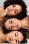 Natural diverse beauty. Portrait of three multiethnic ladies with perfect face skin and natural makeup, vertical shot