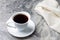 Natural drink chicory in a white Cup with a saucer on a marble background