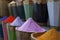 Natural dyes, colorful and vibrant pigment powders in wooden pots