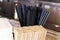 Natural eco-friendly disposable straws in coffee shop on wooden background with copy space. Save the earth, waste reduction