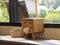 Natural Elegance: Wooden Tissue Box Adorned by Sunlit Window