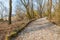 Natural engineering - soil bioengineering. Example of protection of a dirt road from high water and from water erosion