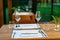 Natural evening table setting with wine glasses in unrecognizeble restaurant