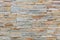 Natural facade stone decoration quartzite background texture. modern granite stone wall